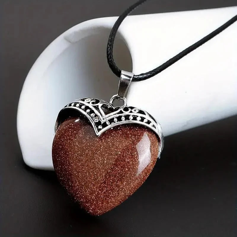 Beautiful Heart Shaped Natural Stone Pendants for the Goth, Steampunk and Boho geeks. Or for those who love the style!