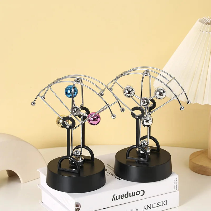 Perpetual Motion Parachute shaped desk ornament. Great addition to the geek study space.
