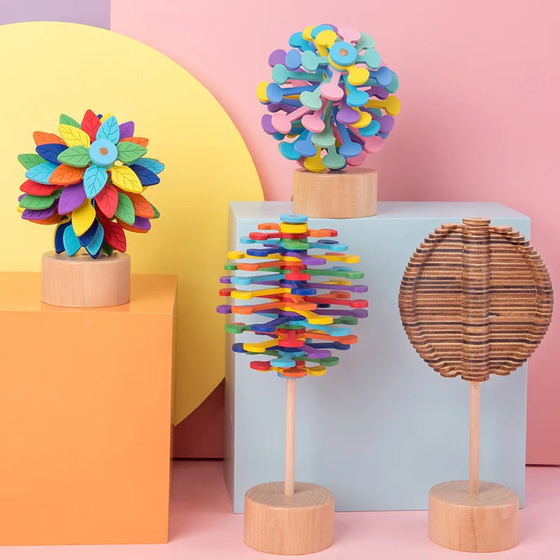 Wooden Spiral Tree toy. Great for kids and adults. Cool fidget and dexterity toy. Choose from a three colour themes.