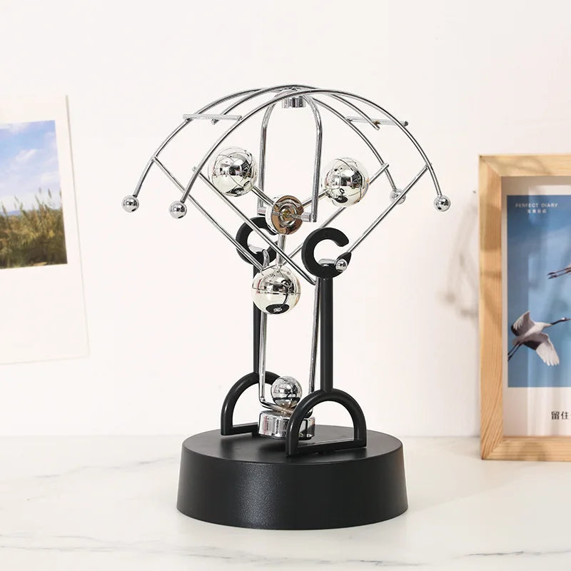 Perpetual Motion Parachute shaped desk ornament. Great addition to the geek study space.
