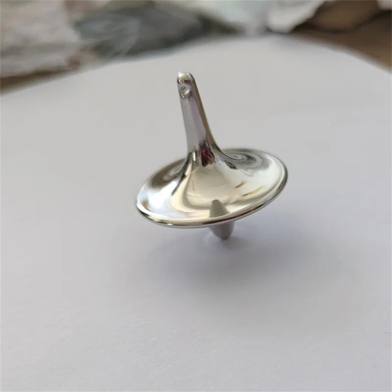 Metal long spinner. Challenge yourself to how long you can keep it spinning!