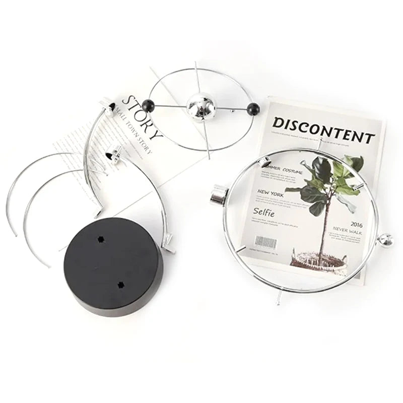 Awesome 25cm tall perpetual motion desk top ornament.