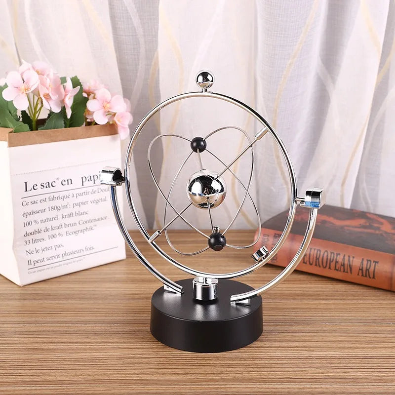 Awesome 25cm tall perpetual motion desk top ornament.