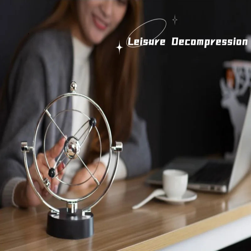 Awesome 25cm tall perpetual motion desk top ornament.