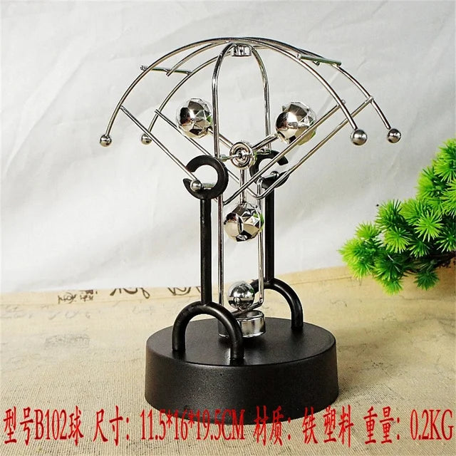 Metal Perpetual Motion Parachute desk ornament. Add some fascination to your living or study space!