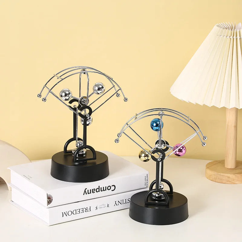 Perpetual Motion Parachute shaped desk ornament. Great addition to the geek study space.