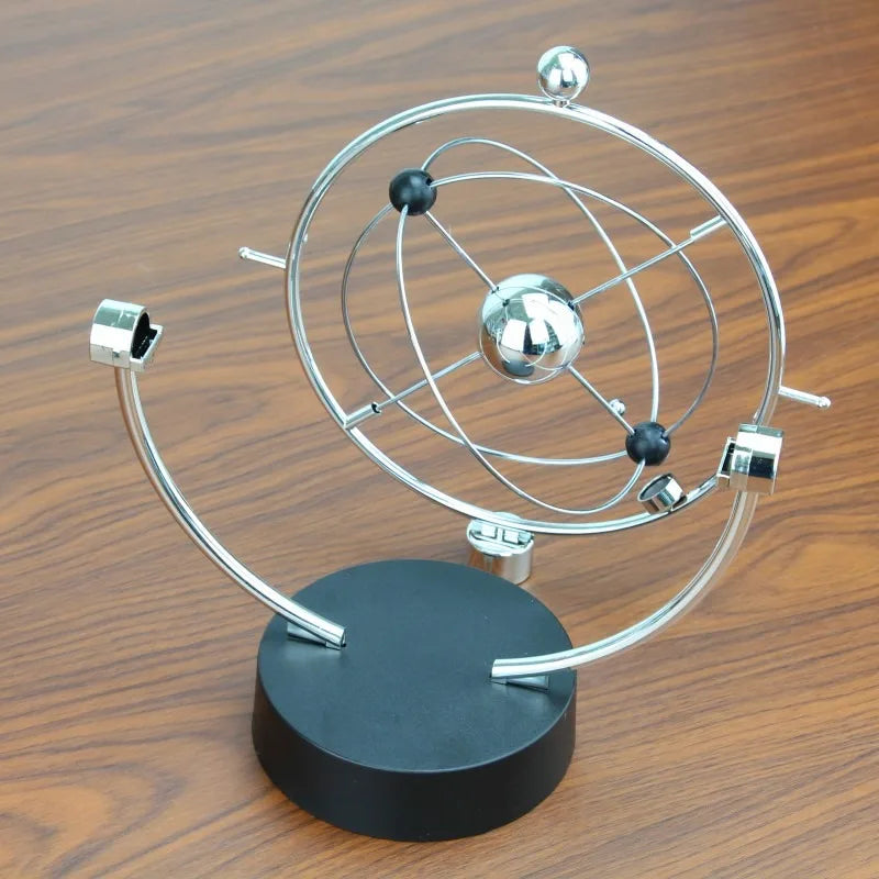 Awesome 25cm tall perpetual motion desk top ornament.