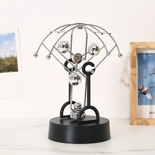 Perpetual Motion Parachute shaped desk ornament. Great addition to the geek study space.